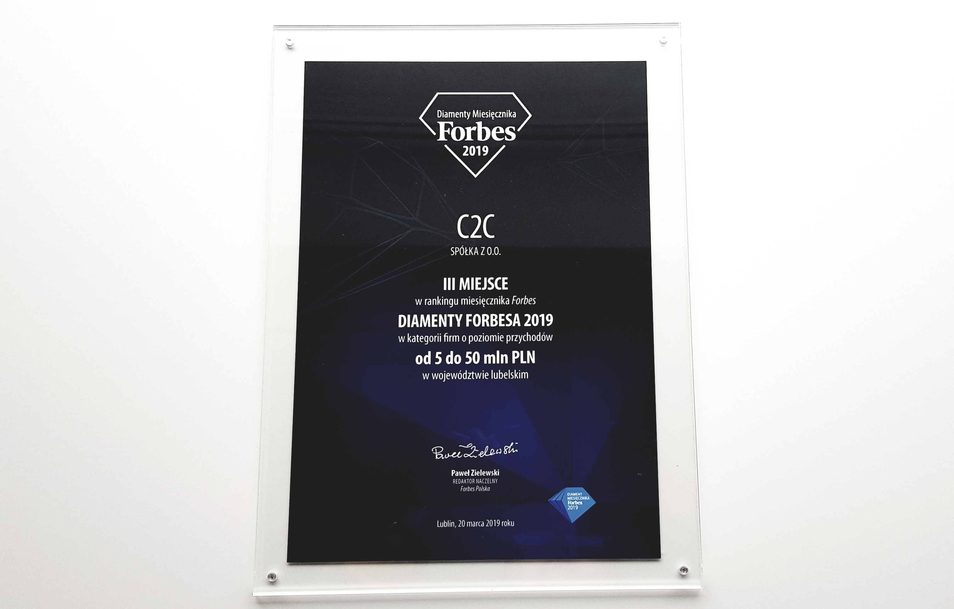 The framed prize Forbes Diamonds 2019 for company C2C sp. z o. o. o.